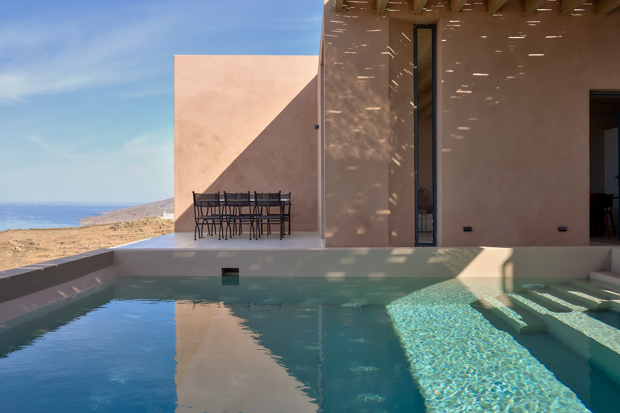 The iconic villa features two outdoor pools
