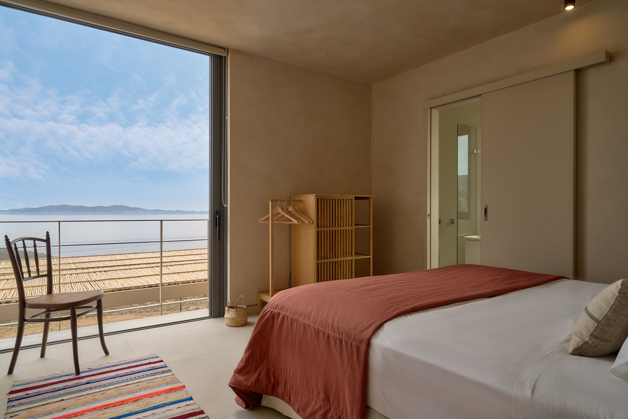 Twin bedroom located on the 1st floor, featuring sea views & en-suite bathroom with walk in shower.