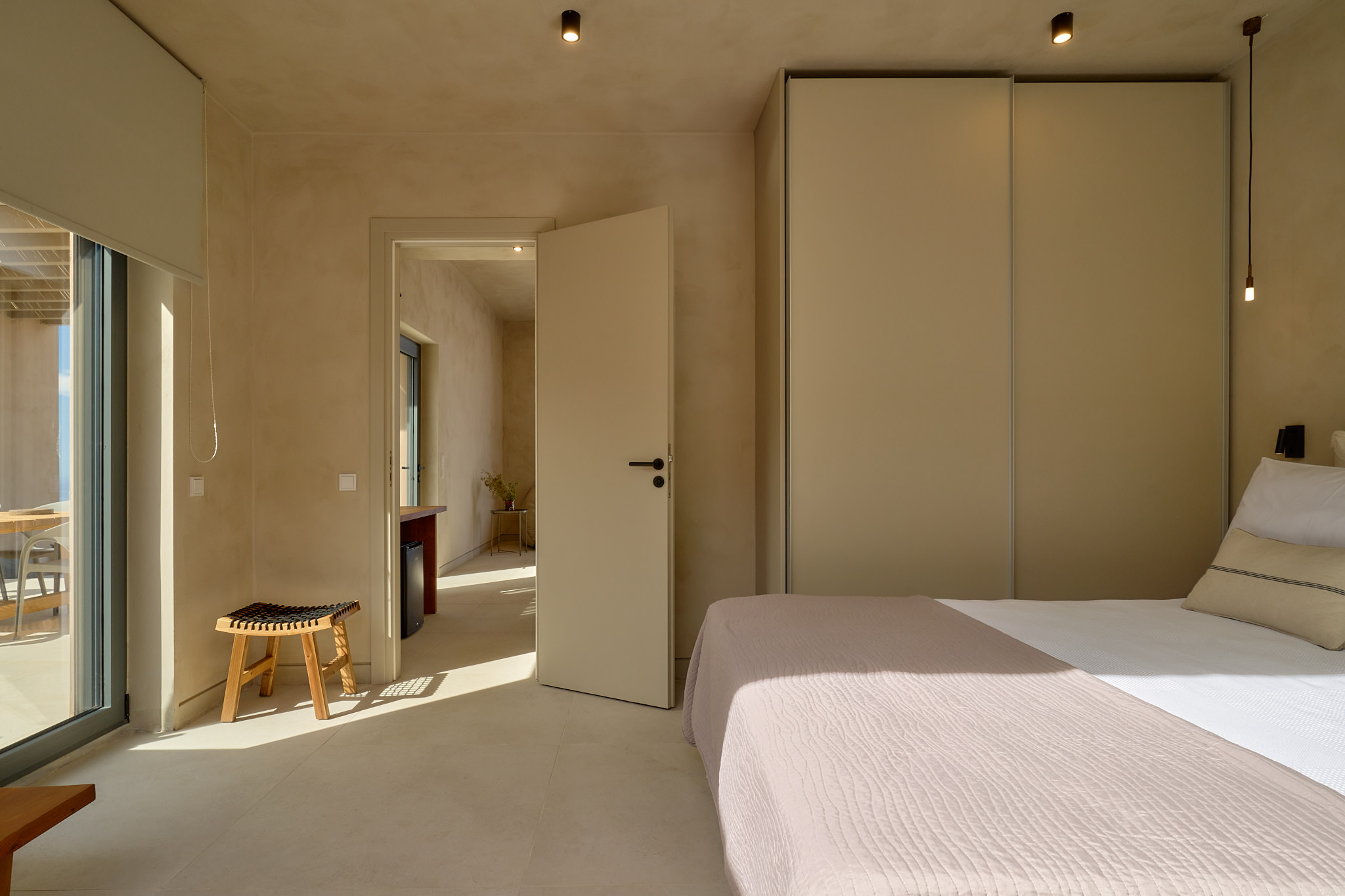 The double bedroom features a closet & access to a separate living-cum area.