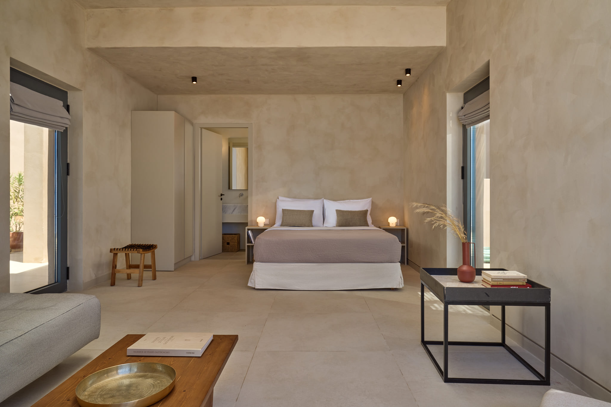 The "4th suite" features a Queen Size bed, with en-suite bathroom & a comfy lounge area.