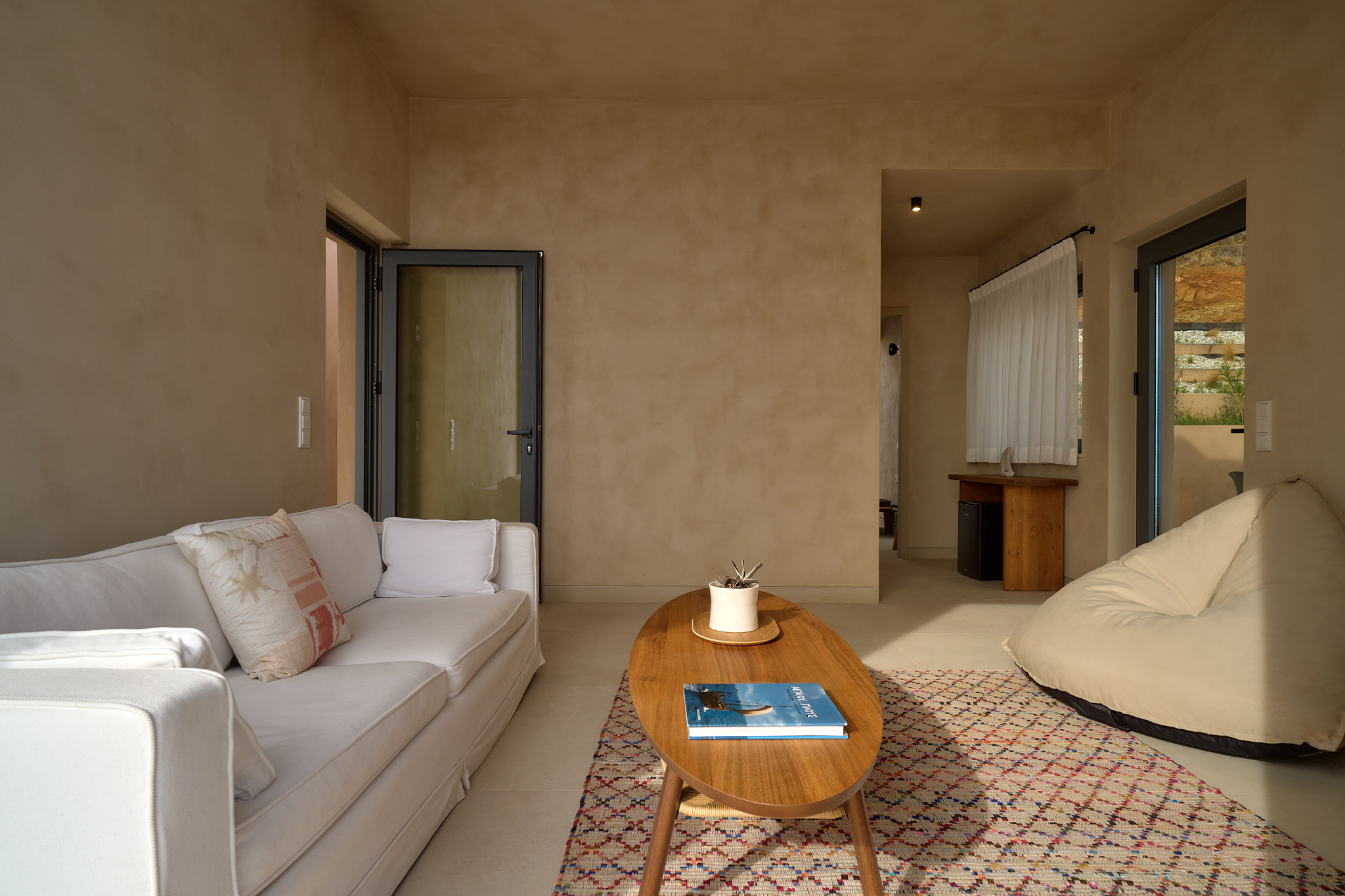 The "2nd suite" features a cozy lounge area, a bedroom & bathroom with walk in shower.